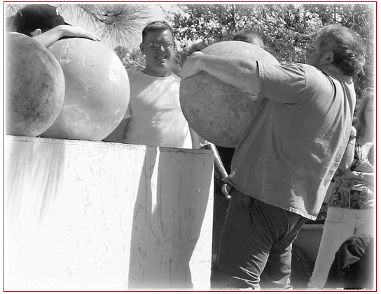 Tom Loading a 350 lb. Atlas Stone